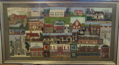The tapestry, made by members of the WI, shows houses in the Old Town and is in the Museum