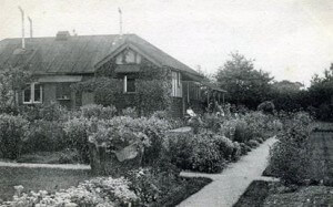Bois Cottage c1905 with Henrietta Busk on the Porch