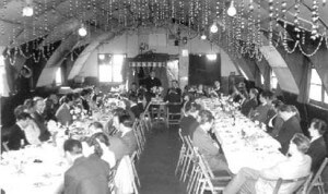 A Christmas party in the Hodgemoor Resettlement Camp dance hall. (Photo courtesy of Zosia Biegus)