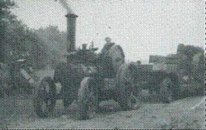 The picture shows a Garratt steam traction engine being driven by an ex German Prisoner of War from Hanover