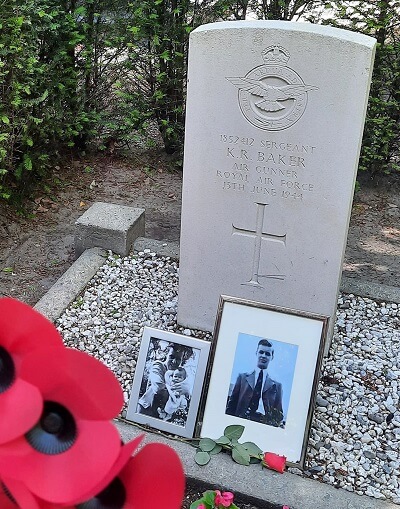The grave of Sgt Keith Baker with the photo of Keith Baker and his nephew Richard Gann who was unable to attend the ceremony 13 June 2022
