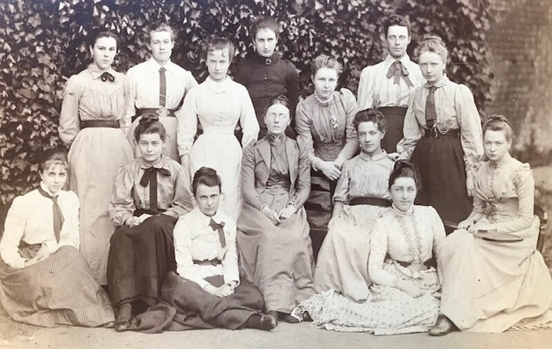 Madeline is on the left (middle row). Miss Edith Hastings the Headmistress is in the centre. Standing at the end on the left is Kitty Ramsay, later the famous Duchess of Atholl, and standing at the far right is Gertrude Elles, later a very distinguished geologist. Date 1891 or 1892, courtesy of Wimbledon High School 