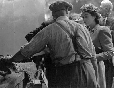 Alf, demonstrating brickmaking to Princess Elizabeth. His wife, Esther was furious with him for not removing his cap! Courtesy Matthews family