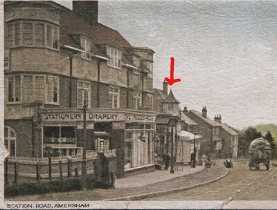 Station Parade and Station Road c 1910 with Turret House marked with a red arrow and Domestic Stores on the ground floor