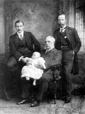 Sir Henry Harben (seated with great grandson) with his son Henry Andrade Harben (right), and his grandson Henry Devenish Harben (left)