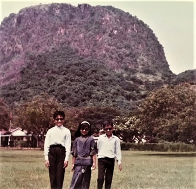 Sejal and two of her brothers in front of The Rock, Tororo, Uganda