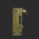 A brass mortice lock mechanism with visible latch and bolt components, viewed from the side against a plain dark background.