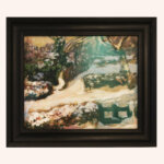 A framed painting depicts a snowy landscape with trees, bushes, and a bench, all covered in snow. Soft sunlight filters through, casting gentle shadows and creating a serene winter scene.