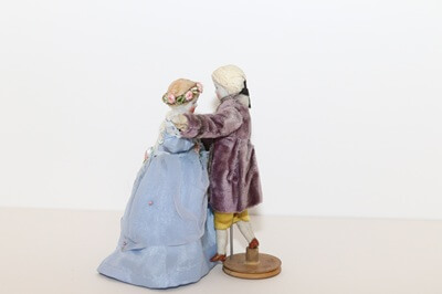 Figures dancing at the ball