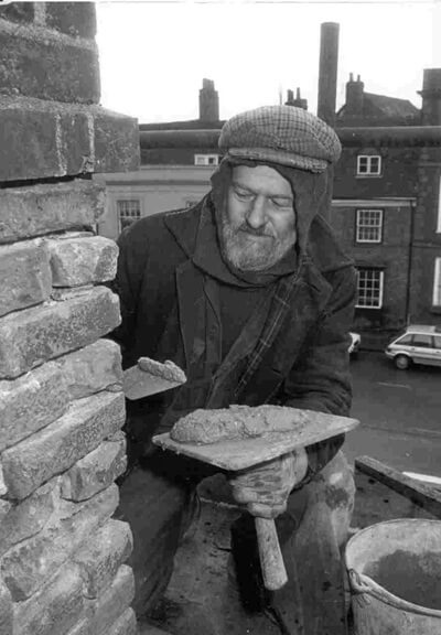 Chris Wallis working on the repointing