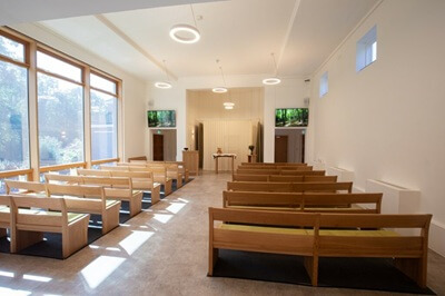 The simple interior of Harold Orr’s Hampden Chapel
